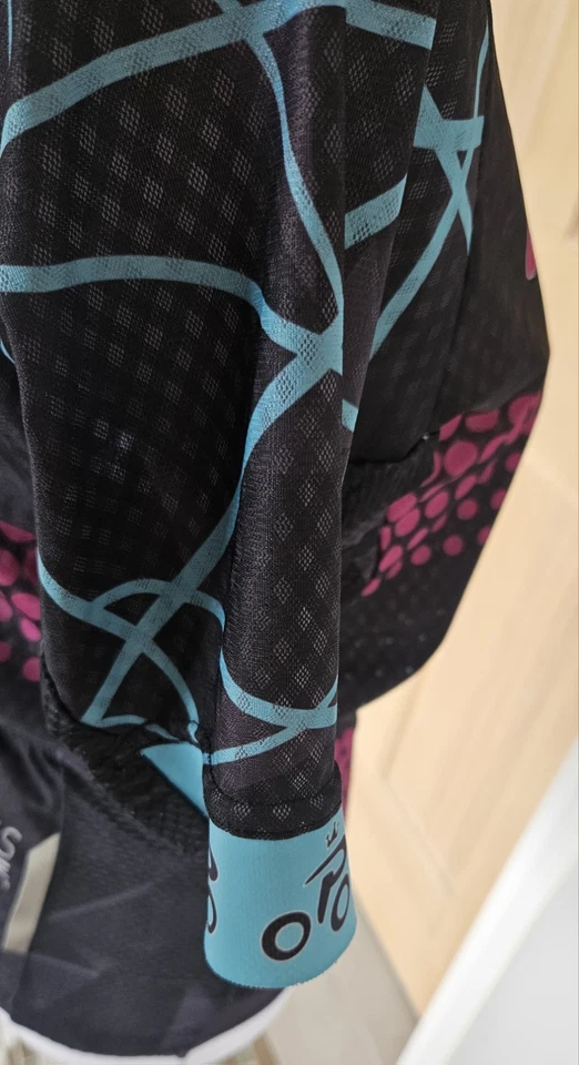  Camiseta deportiva de ciclismo con cremallera 1/4 para mujer M con bolsillo trasero negra rosa azul Foto 3 de 4