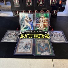 Tua Tagovailoa 2025 Mosaic Silver Prizm , 24 Notoriety Green Prizm & More (6)