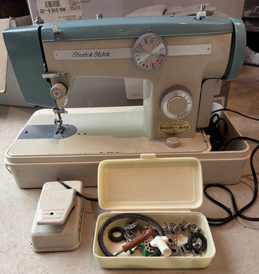 NECCHI-ALCO IMPORT TEAL SEWING MACHINE W/ CASE, PEDDLE & EXTRAS STRECH STITCH