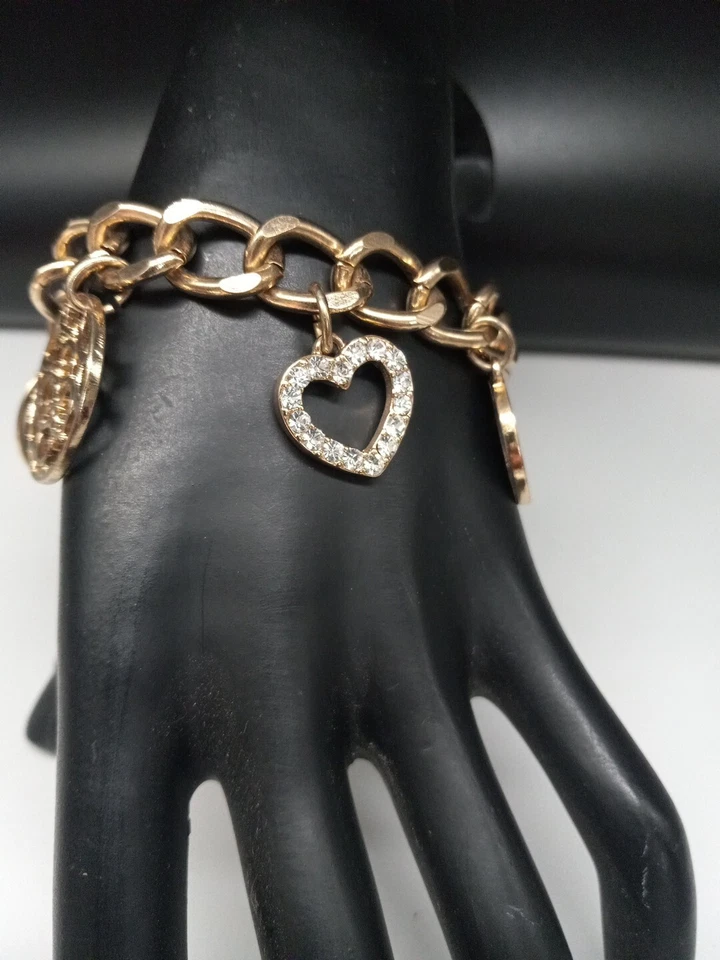 Pulsera GUESS BRAND Logotipo Tono Dorado Cristales Transparentes Esmalte Dijes Palanca Foto 3 de 4