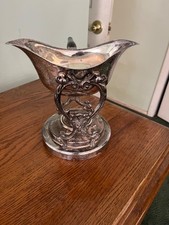 1 English silver gravy boat, 1 Rogers moonbeam 4813 gravy bowl