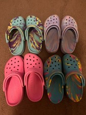 Crocs youth size 6 different colors and different pairs and slightly used