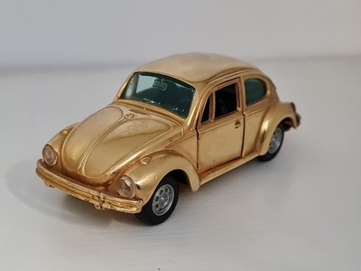 Gama 1:43 VW Käfer goldmettalic im gebrauchtem Zustand  ohne Verpackung 
