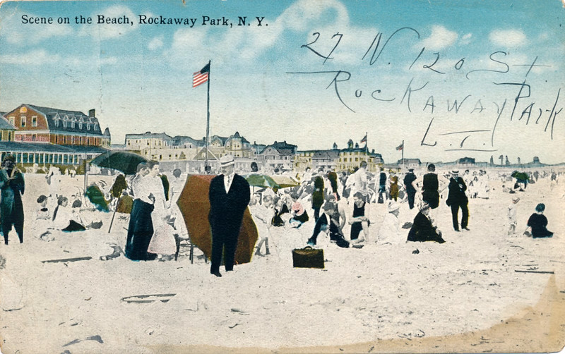 SCENE ON THE BEACH, ROCKAWAY PARK, N.Y. QUEENS. BUILDINGS/HOTELS BACKGROUND.