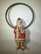 ANTIQUE CELLULOID SANTA CLAUSE CHRISTMAS ORNAMENT ON SWINGING RING