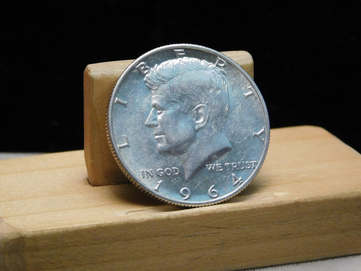 1964-D Kennedy half dollar re-punched 1964-D Kennedy half dollar re-punched
