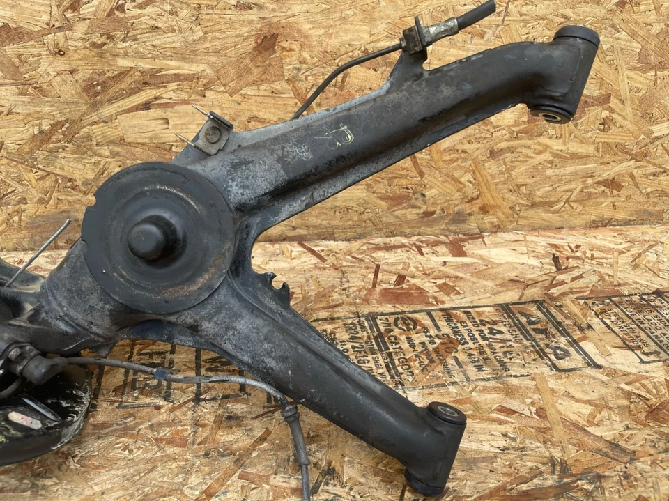 85-03 BMW E30 M3 325iX Brazo de control inferior trasero derecho Cojinete de rueda OEM Foto 3 de 4