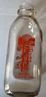 Vintage Gustafson Dairy glass milk bottle from Burlington, Iowa