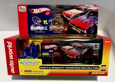 Auto World HO Slot X-traction Hot Wheels Mongoose II vs. Snake II Peterbilt 359