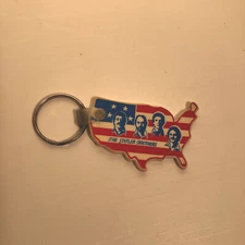 Statler Brothers Vintage Rubber USA Shape Keychain Zipper Pull Flag Patriotic
