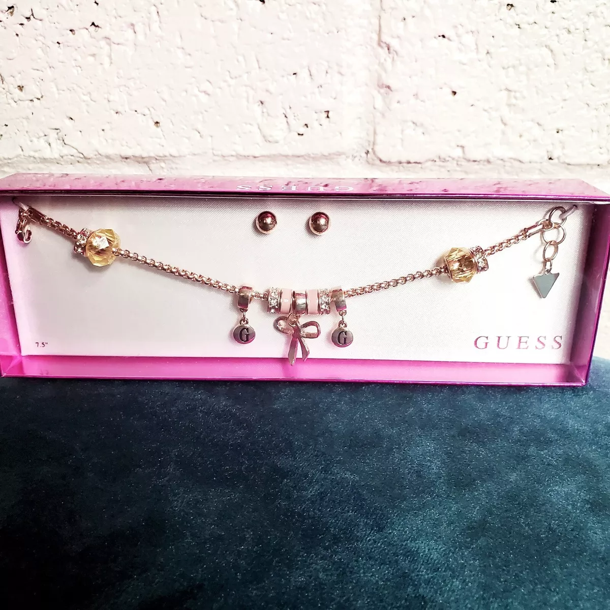 Guess charm bracelet clearance and earring set