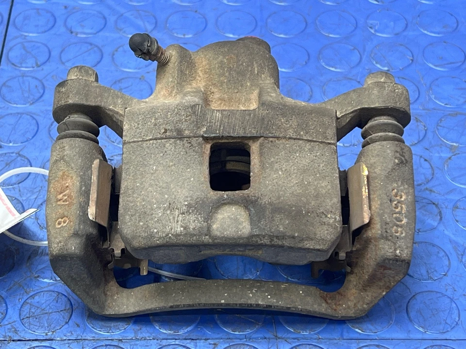 Pinza de freno trasera derecha lado pasajero Mitsubishi Eclipse 96-05 OEM MR129584 Foto 4 de 4