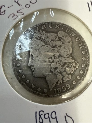 1899-O Morgan Silver Dollar In VG Condition