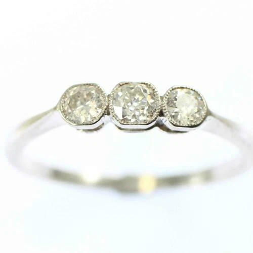 Included (I1) Diamond Three-Stone Fine Rings