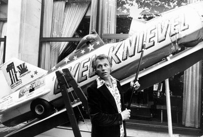 American stunt artist Evel Knievel points to his Sky Cycle X 2 plan- Old Photo
