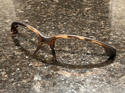 authentic Oakley unstoppable center frame or arm parts