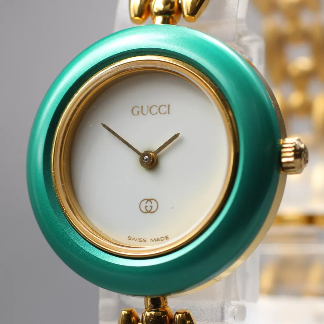 [Presque comme neuve] Montre femme Gucci lunette changeante 1100 L lunette dorée verte quartz