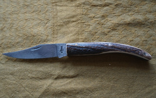 CLASP KNIFE WITH DAMASCUS BLADE AND ANTLER HANDLE