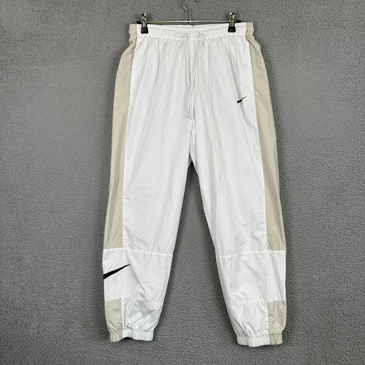 Nike women's windbreaker shop pants