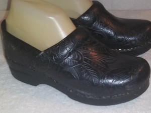 dansko tooled leather clogs