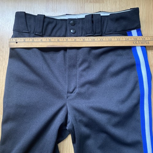 Black men's baseball pants with blue and white striped side panels, button closure, and Olympic logo on waistband.