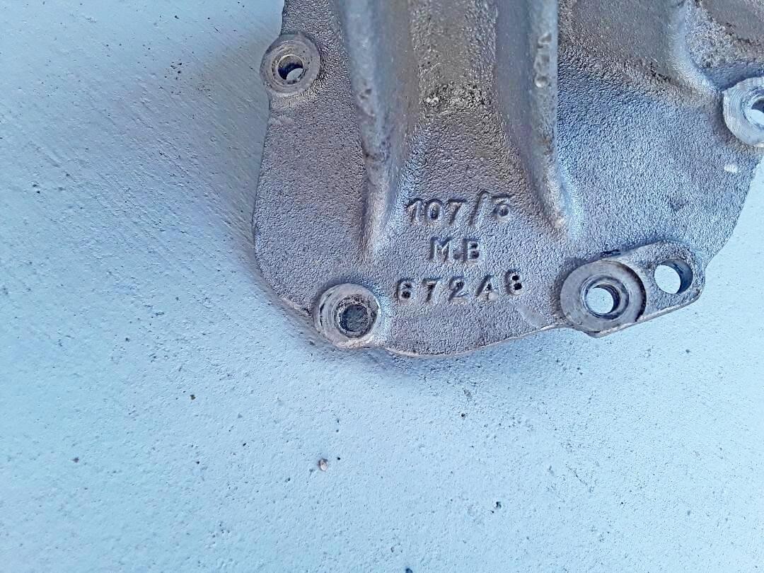 Maserati Indy front engine housing with cam chain tensioner and pulley driver