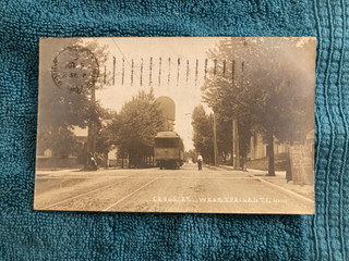Cartolina RPPC Cross St Trolly Stop West Ypsilanti Michigan pubblicata c1910 bianchi