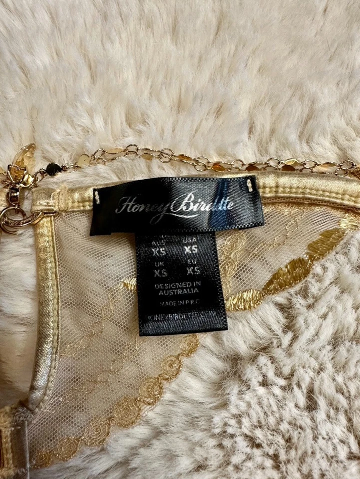 Tanga dourada RARA🔥 Honey Birdette GOLDY✨💛 XS - Imagem 3 de 4