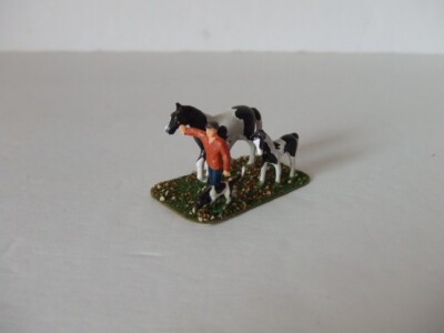MAN LEADING HIS BLACK TOBIANO  PAINT HORSE MARE & FOAL, MERTEN DOG FIGURE HO