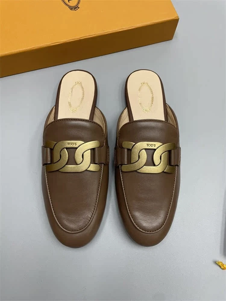 TOD’S Scarpe basse donna Tod's mezza punta con bottoni in pelle ritorti scarpe