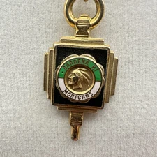 Vintage gold-tone square necklace with enamel Gardena High School Mohican emblem