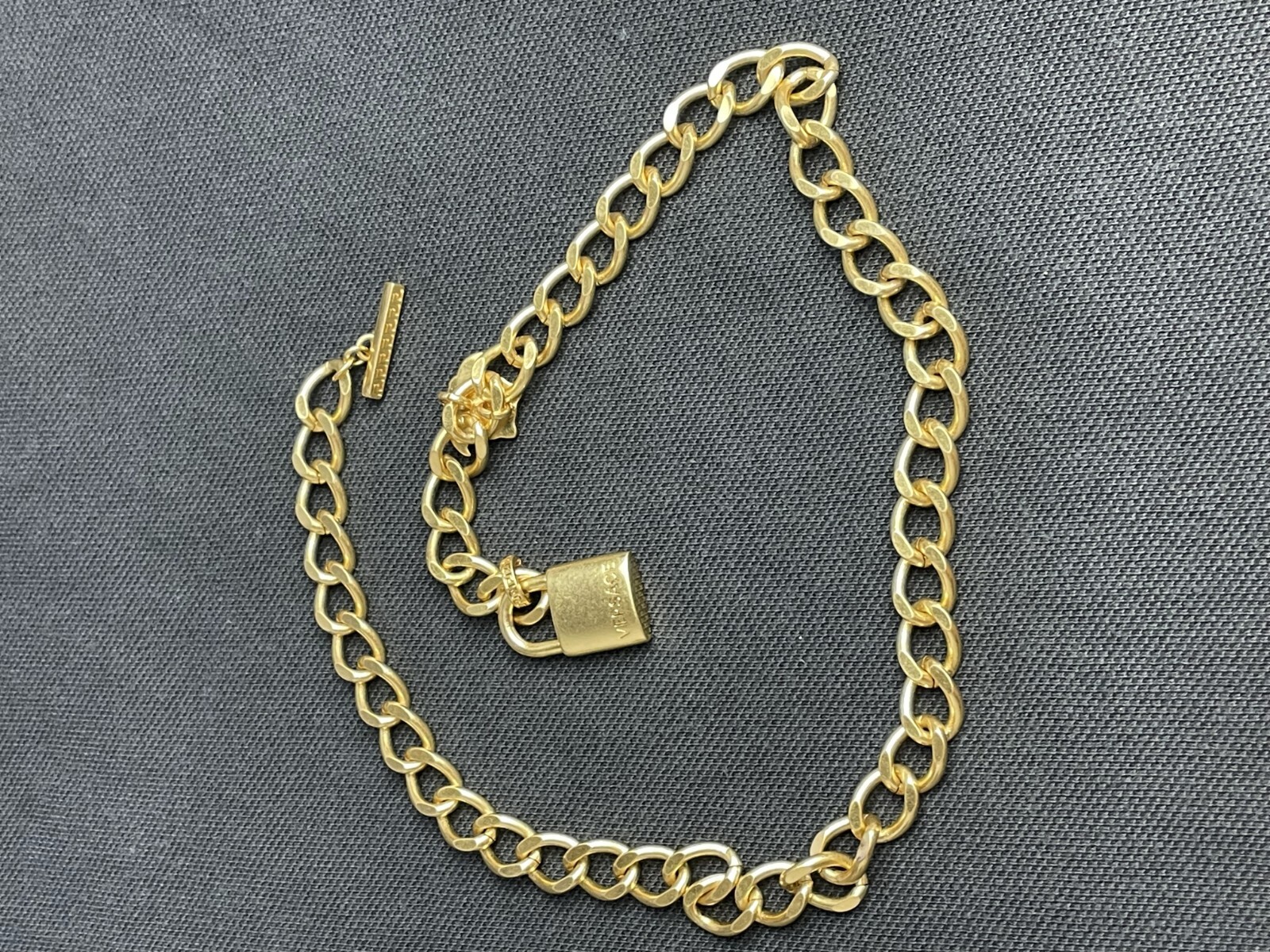 Versace Gold Rolo Lock Pendant Necklace Elegant Sophisticated Design