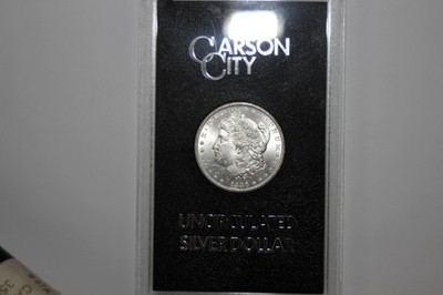 1883-CC GSA Morgan Silver Dollar in the Original Packaging/COA