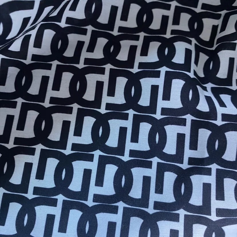 Tela mezcla Deadstock DG por yarda 55 % seda morera 45 % algodón logotipo Foto 3 de 4