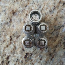 Nissan Pathfinder Murano Maxima Oem Wheel Lock Set Nissan Pathfinder Murano Maxima Oem Wheel Lock Set
