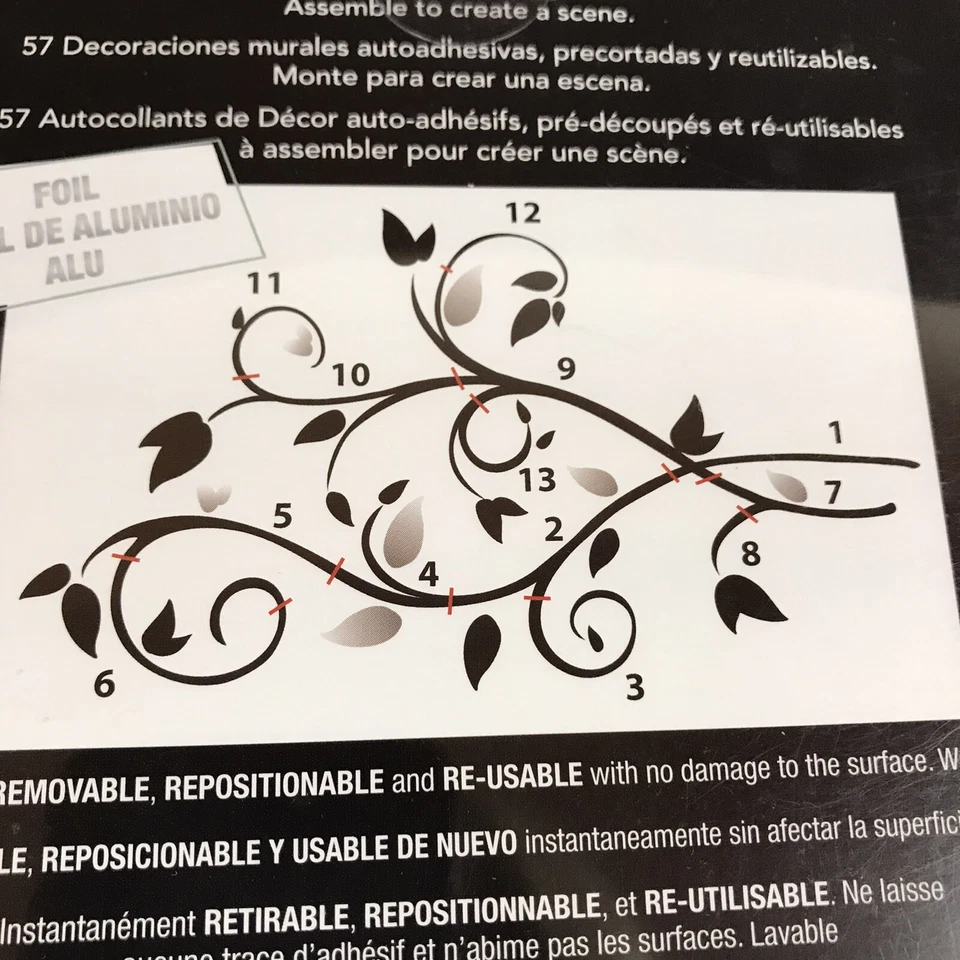 Calcomanías de pared RoomMates negras con hojas de aluminio pelar y pegar Foto 4 de 4