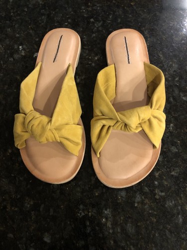 mustard yellow flip flops