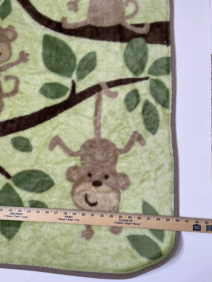 Manta bebé Carters de colección monos verde marrón árboles polar suave Foto 3 de 4