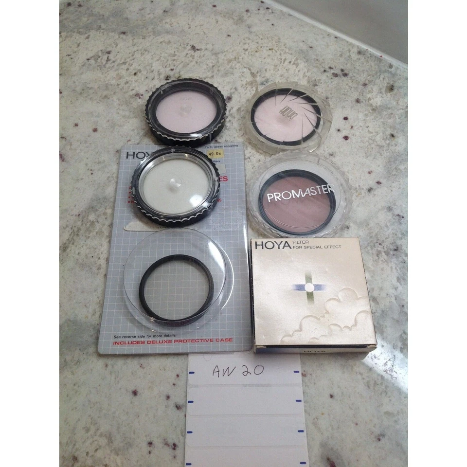 Lote de filtros de lente cuatro 55MM uno 52MM y otro 49MM Hoya Promaster y Yashica Foto 4 de 4