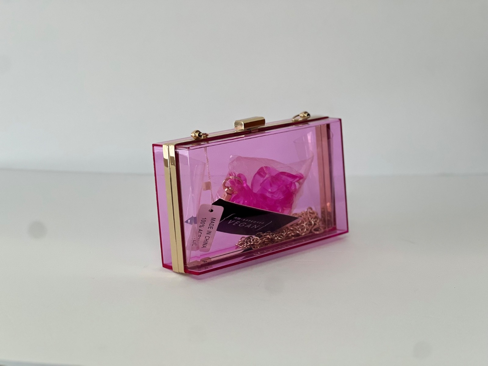 Le Miel pink acrylic box clutch