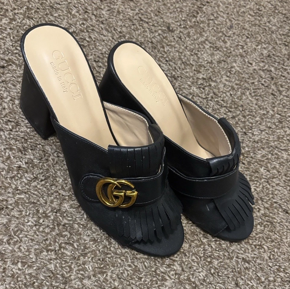 Gucci GG Marmot Kiltie Heel Mules in sleek black Marmot iconic gold logo accent. - Image 4 of 4