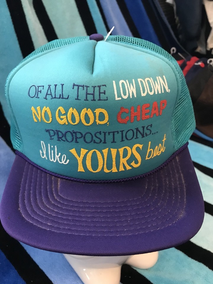 NOS (never worn) vintage trucker hat with an unapologetically unhinged slogan — deadstock novelty gold that money can't easily replicate.