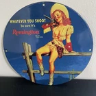 VINTAGE REMINGTON COWGIRL LADY GASOLINE OIL PORCELAIN SIGN