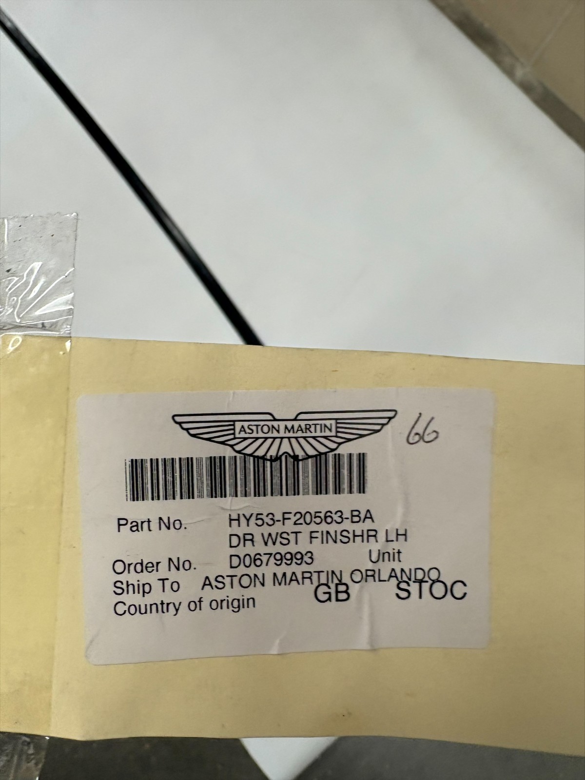 (HY53-F20563-BA) ASTON MARTIN DOOR WAIST FINSHR LH