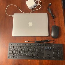 Used 13" Macbook Pro with keyboard  mouse  power source 2015 READ LISTING
