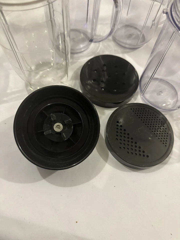 Magic Bullet Accessories Lot Replacement Pitcher, Blade,Cups, Lids, and Rings - Image 2 of 4