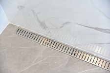 Linear Shower Drains, Brushed Nickel Wind Design by SereneDrains