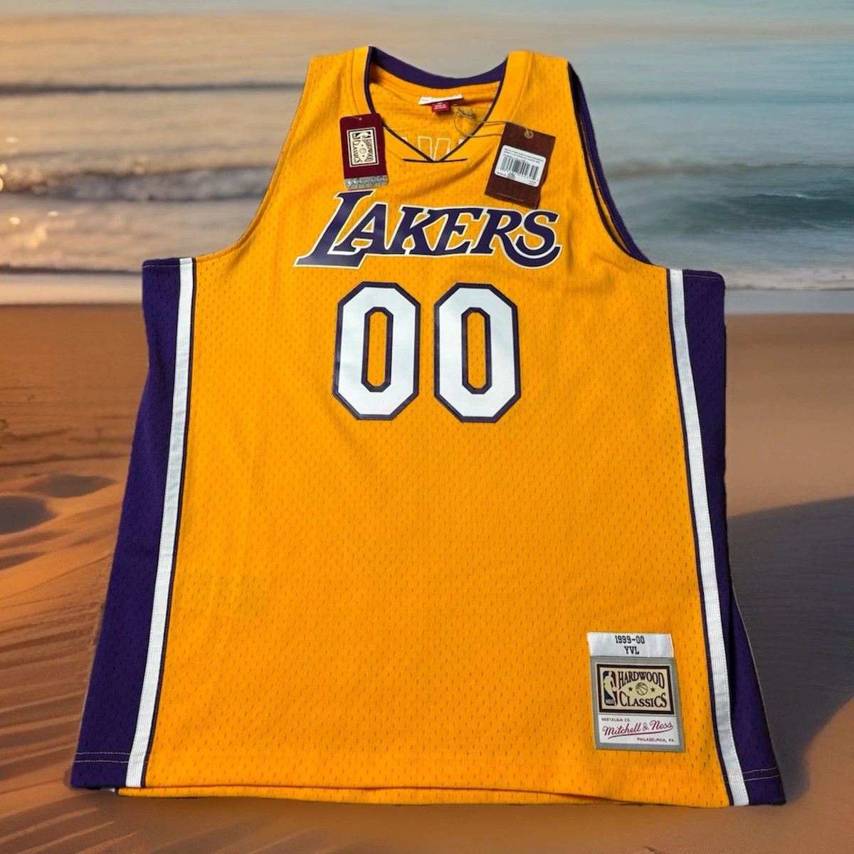 Preços baixos em Mitchell & Ness Los Angeles Lakers NBA Camisas