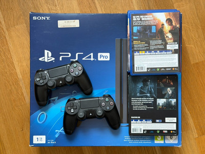 PlayStation 4 Pro (CUH-7216B) 1TB + 2 Controller + 4 Spiele