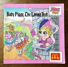 Baby Piggy, The Living Doll McDonald's Muppet Babies book SC McDonald's L1